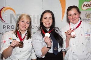 A hot team in competition, from left, EIT students Kayla Hughes, Ashleigh Butler and Sabrina Faes.