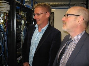NOW chief executive Hamish White (left) and EIT chief executive Chris Collins inspect the hardware used by the Hawke’s Bay-based telecommunications company.   