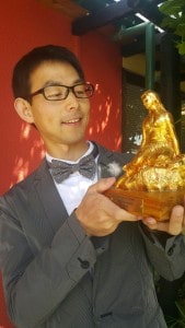Jiangyan Chen admires his Pania trophy.  