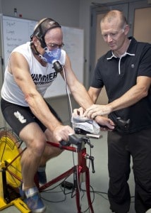 Associate professor Carl Paton monitors oxygen levels while graduate Philip Shambrook exercises in EIT’s sport science laboratory. 