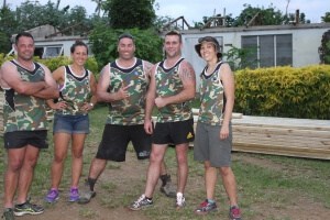 Raising roofs in cyclone-hit Vanuatu, from left, Carl Fairbairn, Kelly Frewin, Jack Pritchard, Todd Rogers and Nikki Wawatai. 