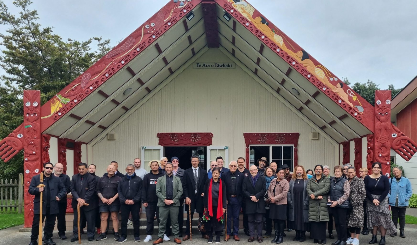 A group of young Maori people collaborating on a food project and a music project, showcasing the future of Maori culture in Auckland.